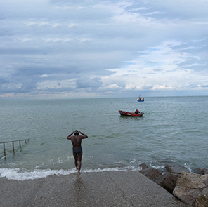 Swimmer returning to water