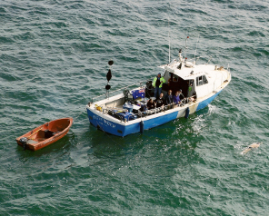 Swimmer alongside Pathfinder